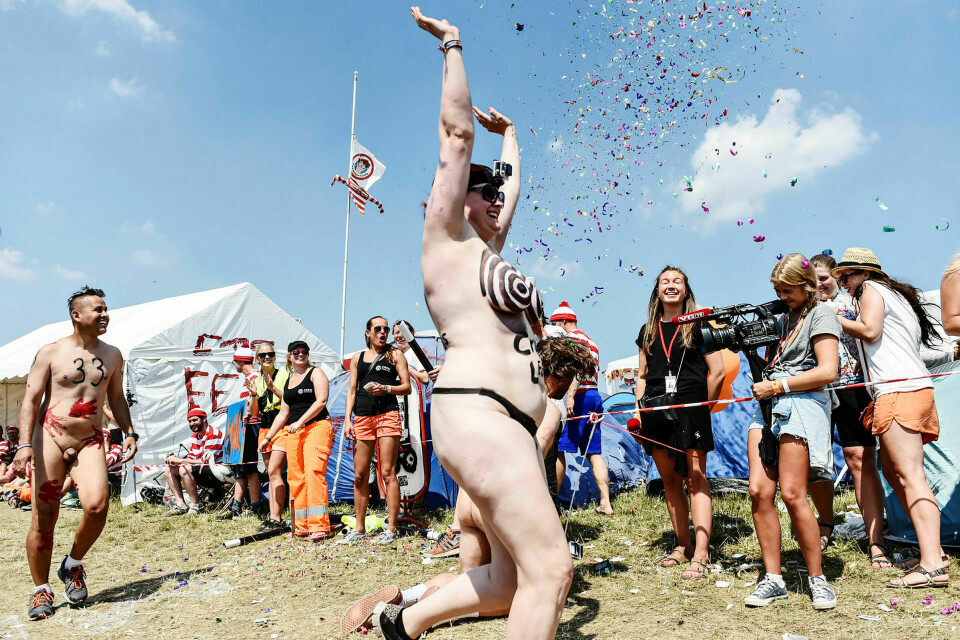 Dansk selvstendighet. Det klassiske «Nøgenløb» på Roskilde-festivalen 2014. Festivalen vil ikke la seg kjøpe opp av noen av de store aktørene som i disse dager tar kontroll over det internasjonale festivalmarkedet. Arkivfoto: Katinka Hustad
